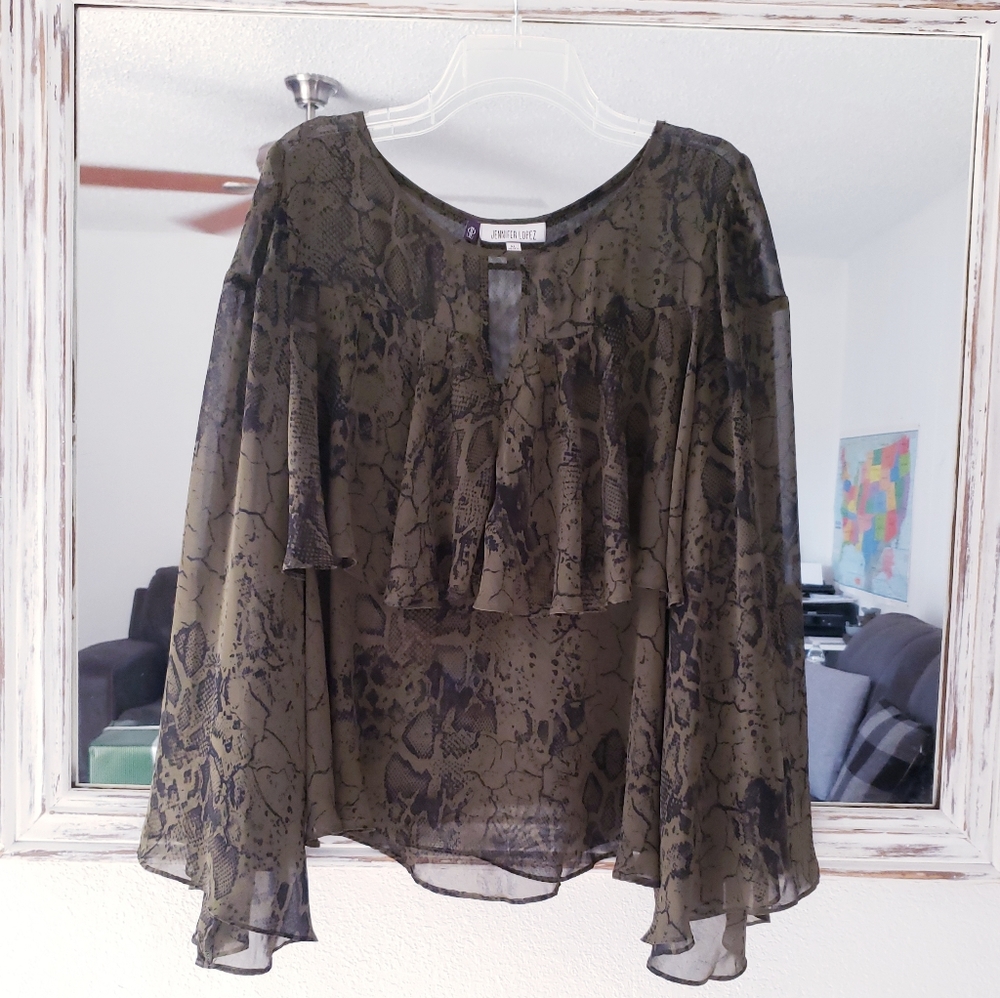 Jennifer Lopez sheer snake print ruffle blouse